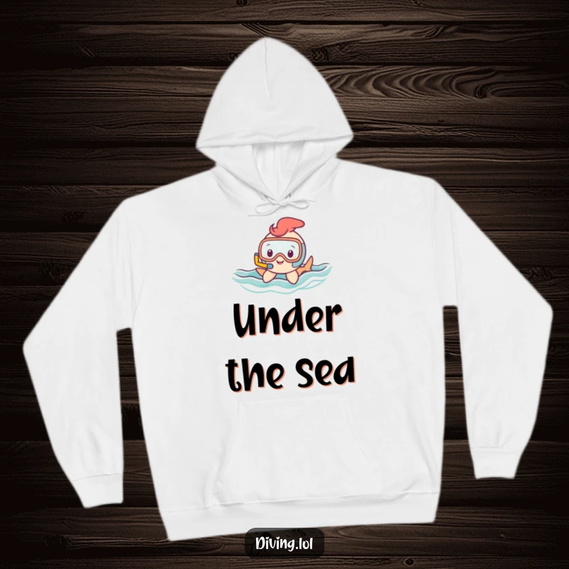 Funny hoodie featuring a small, happy character with a snorkel gracefully gliding through wavy water, offering cozy comfort and aquatic vibes.